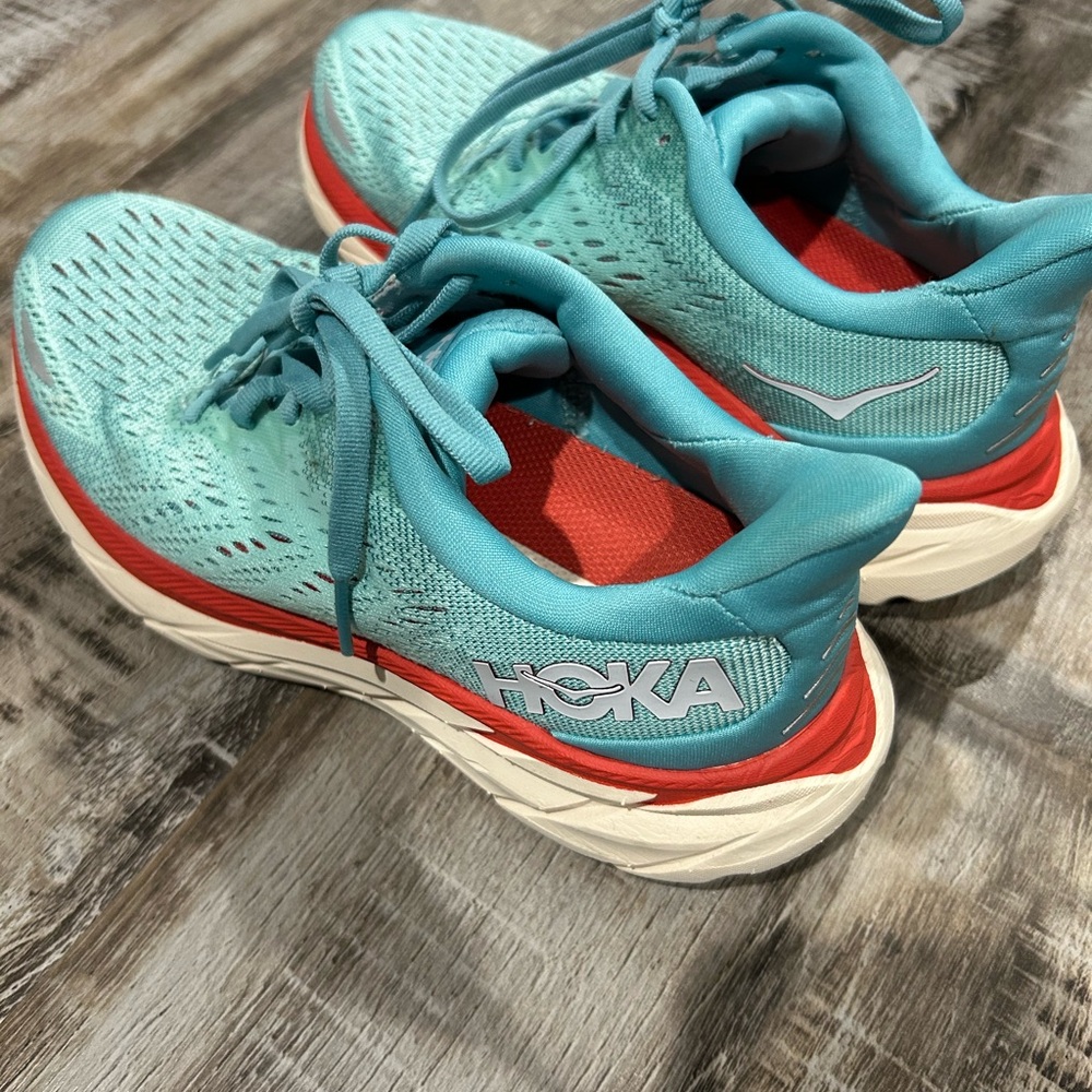 Hoka Blue and Red Athletic Shoes with Maximalist Cushioning